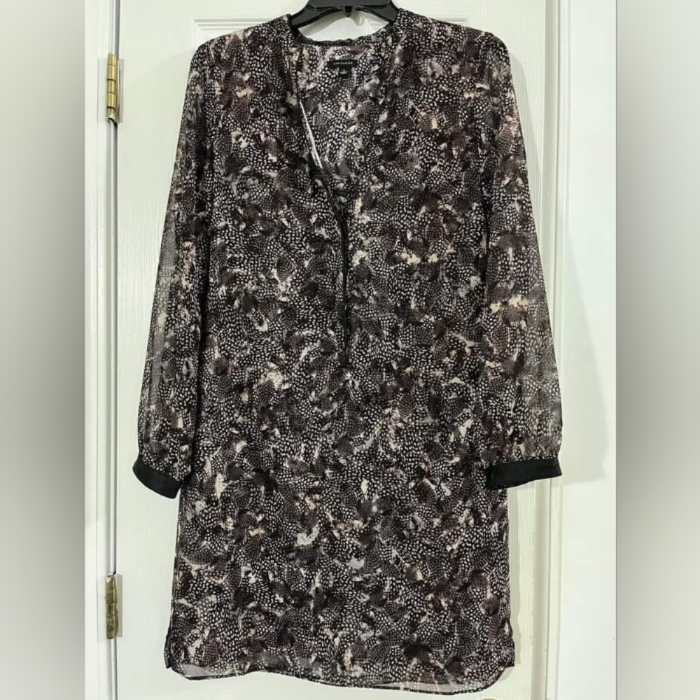 The brand is Ann Taylor, it is size 4, rhe color is brown.